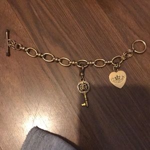 Beautiful juicy couture charm bracelet with charms